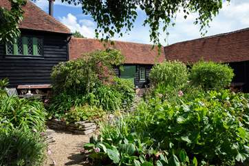 The paths in the courtyard lead to the other cottages so great if you decide to book the other cottages with family or friends.