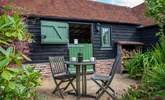 Stable-door onto the courtyard. There are plenty of logs for the wood-burner. - Thumbnail Image