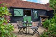 Stable-door onto the courtyard. There are plenty of logs for the wood-burner.