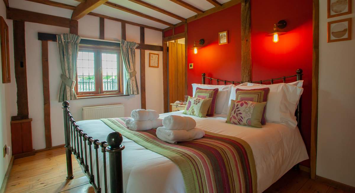 The beautiful beams add to the charm of this lovely ground floor bedroom.