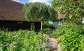 Walk across the communal courtyard where you will find a door to the shared laundry-room. - Thumbnail Image