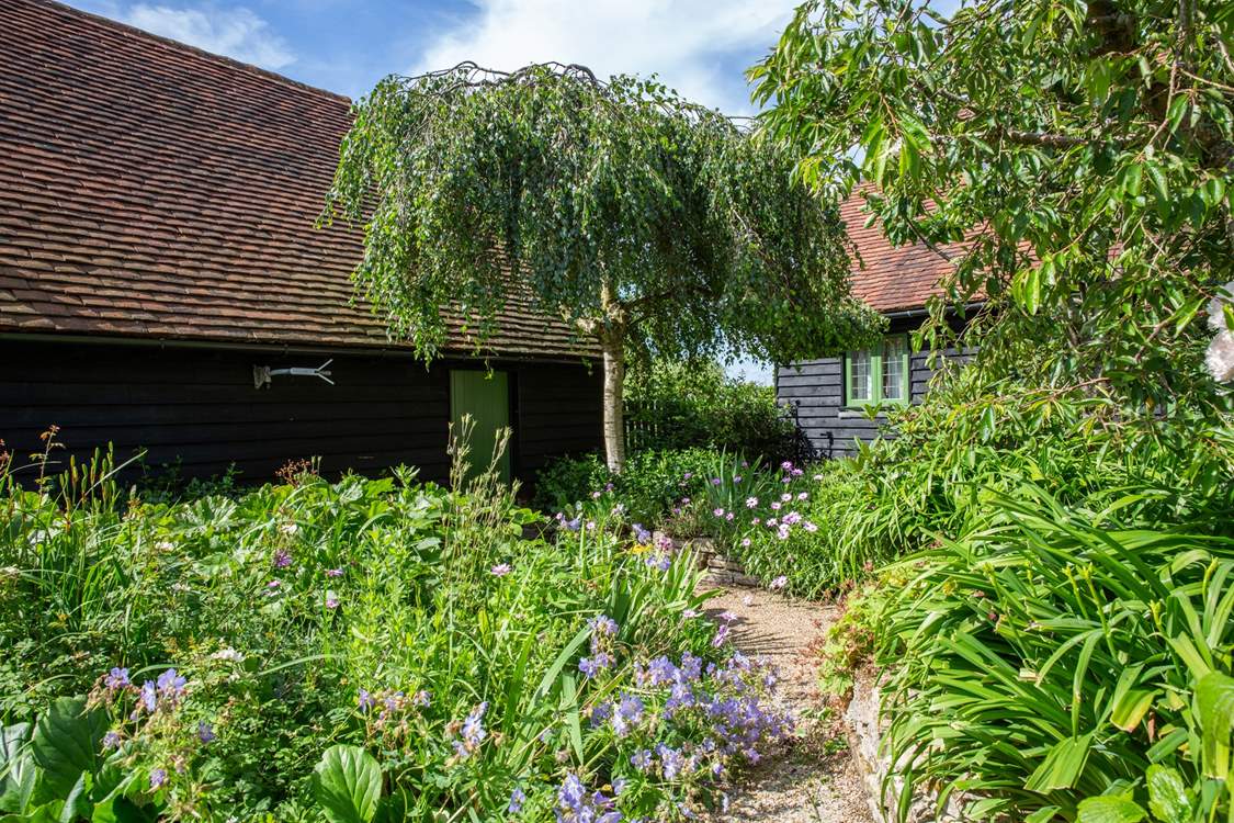 Walk across the communal courtyard where you will find a door to the shared laundry-room.