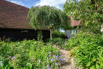 Walk across the communal courtyard where you will find a door to the shared laundry-room.