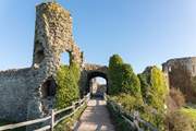 Visit the ruins of Pevensey Castle.