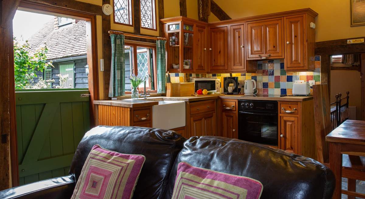 A view of the kitchen area with stable-door to the courtyard garden.