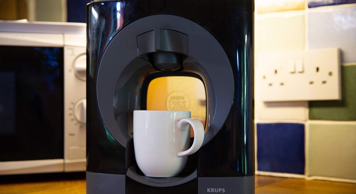 Enjoy a drink from the Dolce Gusto coffee machine.