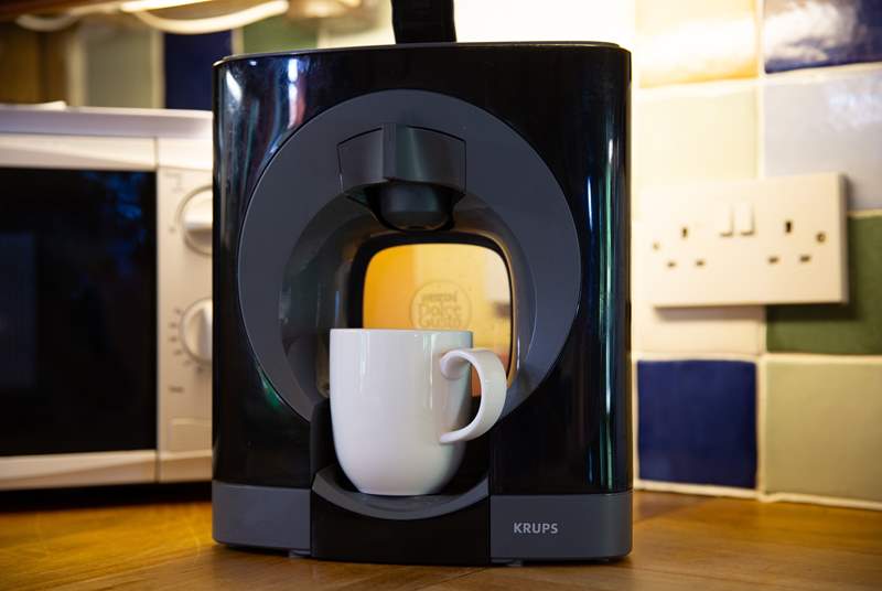 Enjoy a drink from the Dolce Gusto coffee machine.