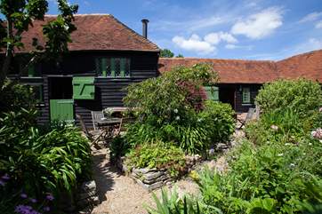 The courtyard is surrounded by pretty plants and gives you the opportunity to chat to fellow guests in the adjoining cottages if you wish.