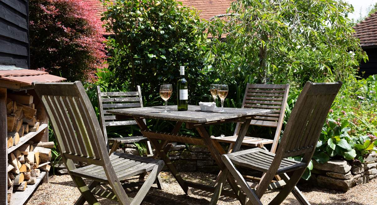 Relax with a glass of something nice in the sunshine.