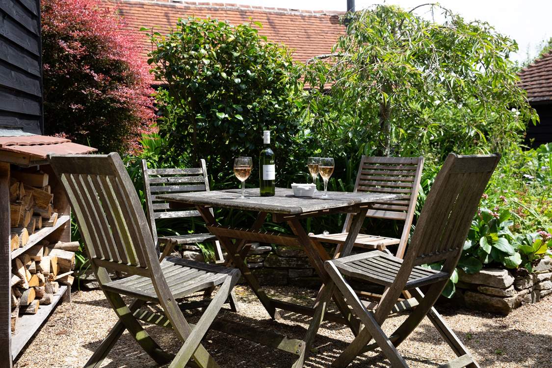 Relax with a glass of something nice in the sunshine.