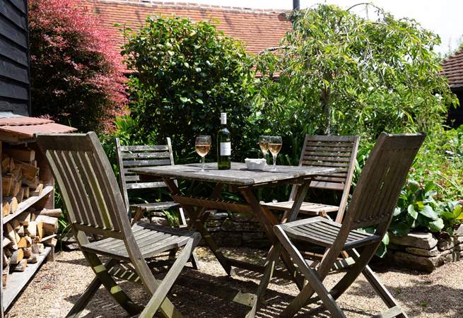 Relax with a glass of something nice in the sunshine.