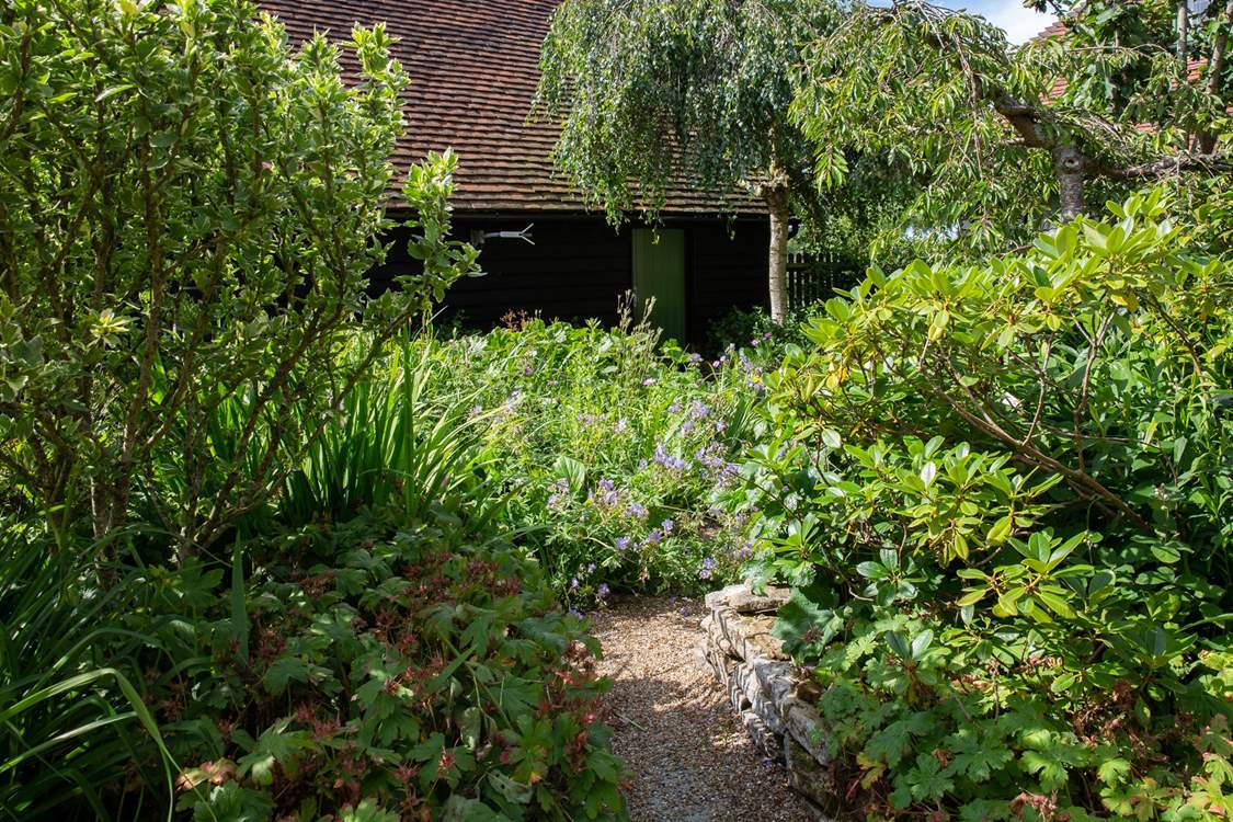 Walk across the communal courtyard where you will find a door to the shared laundry-room.