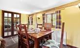 The dining-table has enough seating for up to six guests. - Thumbnail Image