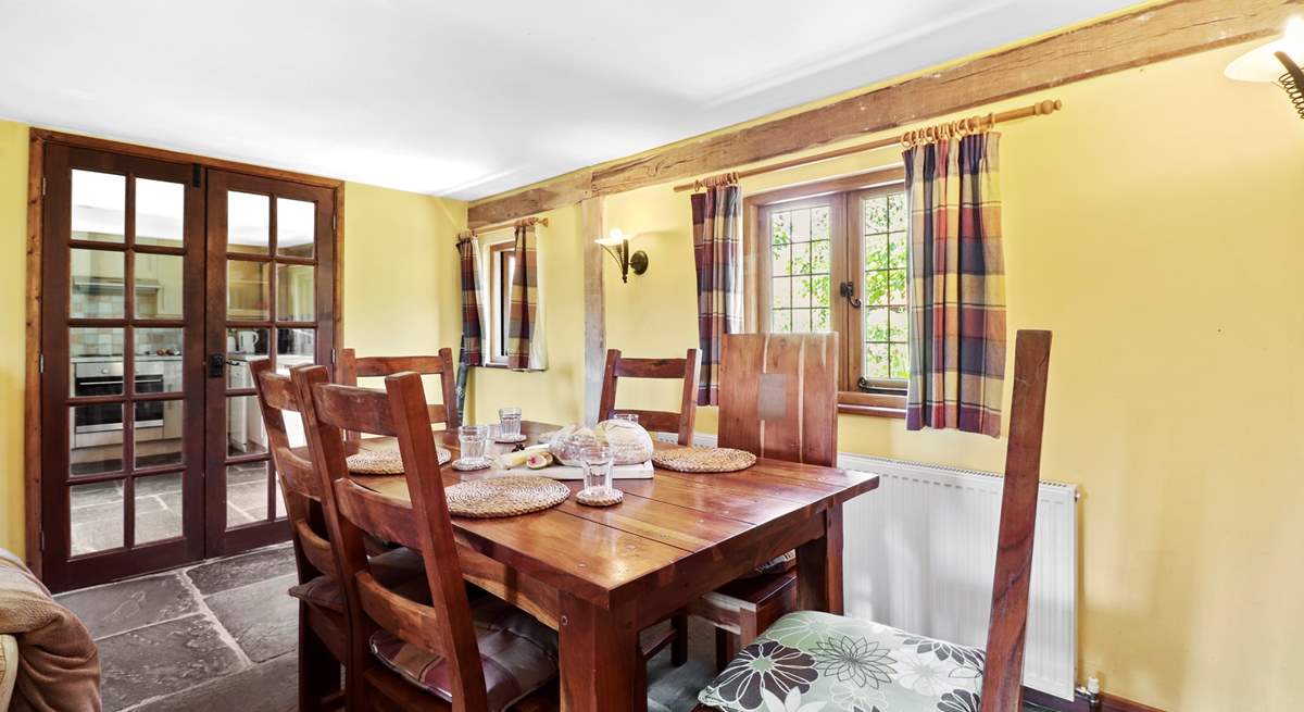 The dining-table has enough seating for up to six guests.