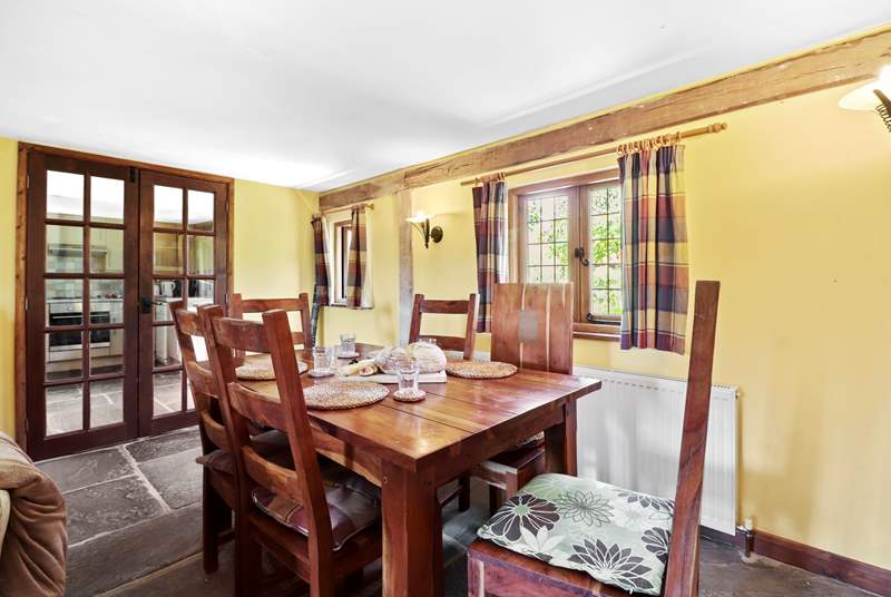 The dining-table has enough seating for up to six guests.