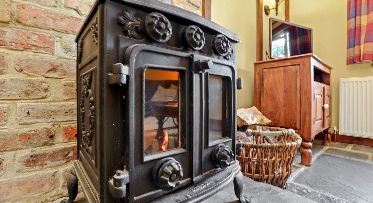 The wood-burner keeps The Coach House cosy.