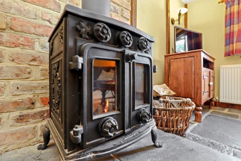 The wood-burner keeps The Coach House cosy.