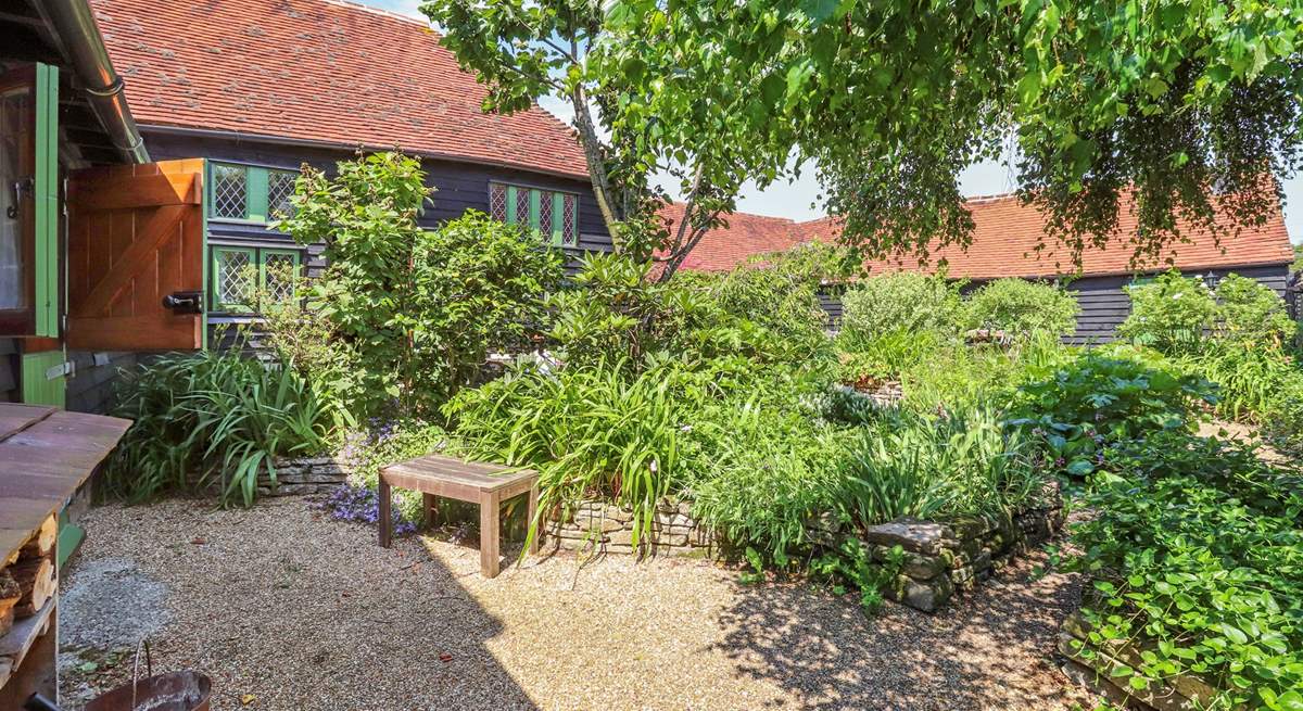 The paths in the courtyard lead to the other cottages so great if you decide to book the other cottages with family or friends.