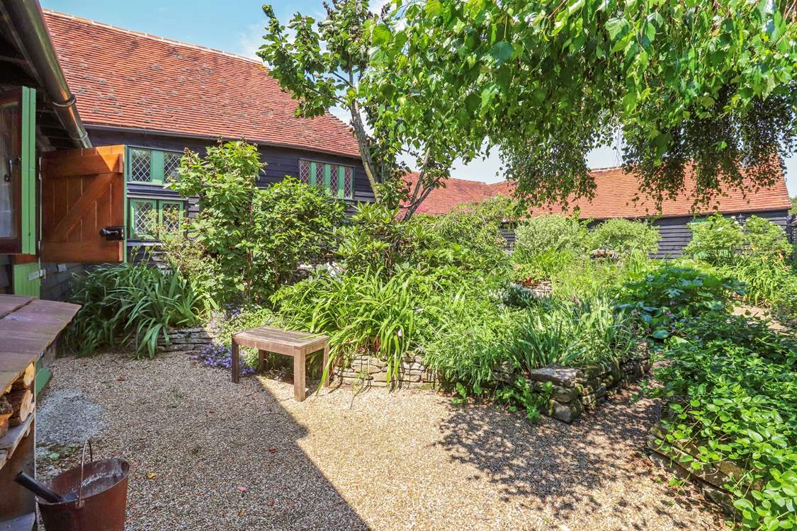 The paths in the courtyard lead to the other cottages so great if you decide to book the other cottages with family or friends.