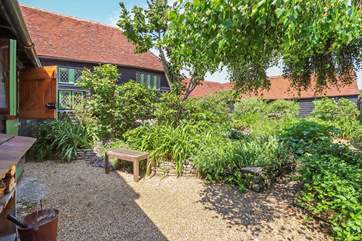 The paths in the courtyard lead to the other cottages so great if you decide to book the other cottages with family or friends.