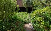 Walk across the communal courtyard where you will find a door to the shared laundry-room. - Thumbnail Image