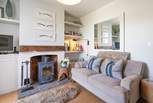 The beautifully decorated sitting-room, lie back and relax with the wood-burner crackling away in the background.