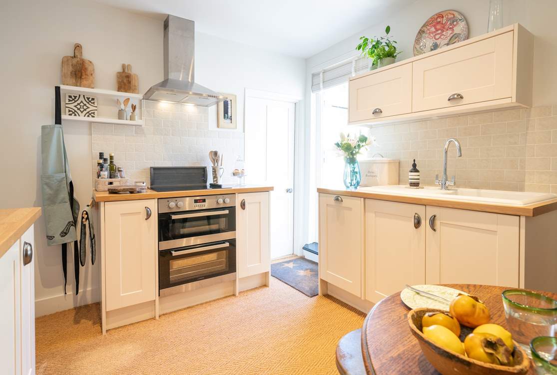 The kitchen/dining-room is modern and well-equipped for you to cook up a treat!