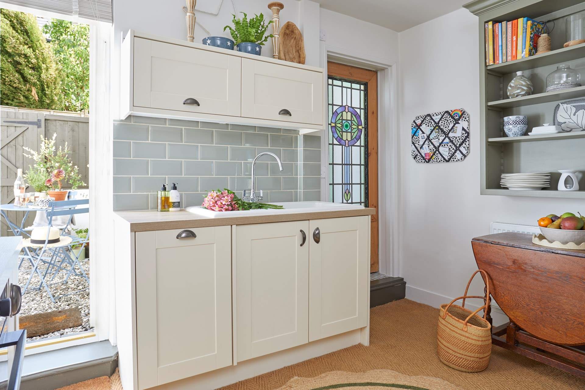 The beautiful cottage style kitchen opens up to the outside space.
