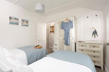 The pretty twin bedroom is a delight.