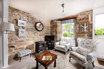 Beautifully furnished, the sitting-room invites you to relax and re-charge.