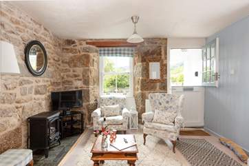 The stable-door opens to the outside patio, letting daylight flood in.