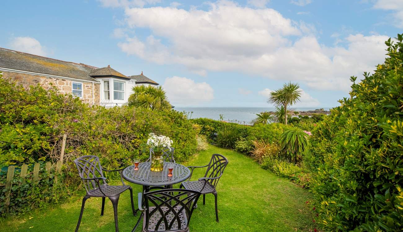 Enjoy a drink in the garden with this spectacular view.