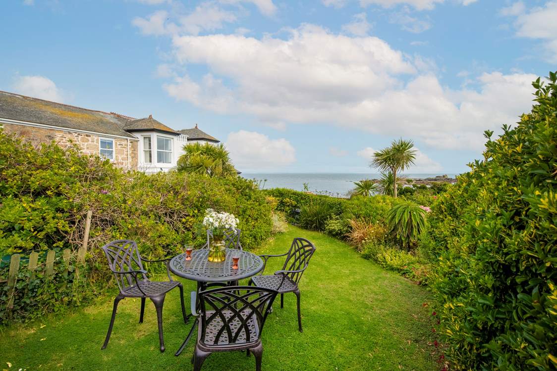 Enjoy a drink in the garden with this spectacular view.