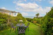 Enjoy a drink in the garden with this spectacular view.