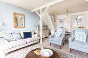 Tasteful furnishings in soft calming shades.