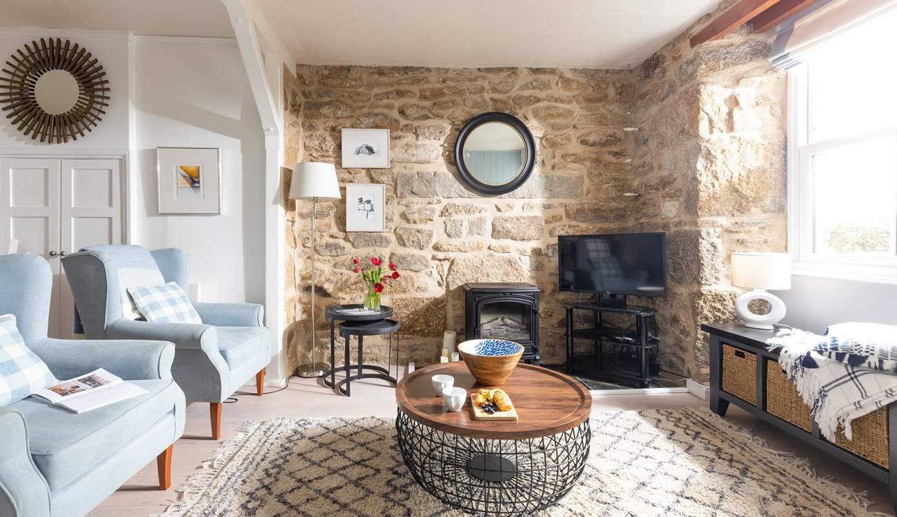 Beautifully furnished, the sitting-room invites you to relax and re-charge.