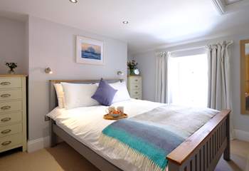Bedroom 1 has a king-size bed and luxury linen to ensure a great night's sleep.