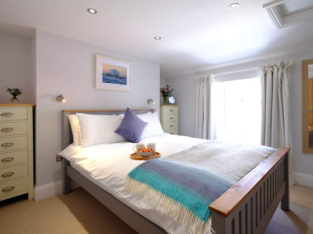 Bedroom 1 has a king-size bed and luxury linen to ensure a great night's sleep.