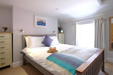 Bedroom 1 has a king-size bed and luxury linen to ensure a great night's sleep.