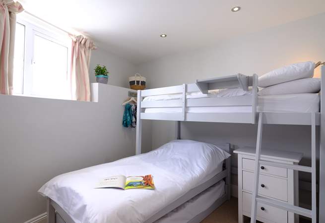 The twin room has bunk-beds and a truckle bed underneath if you don't wish to use the high bed, however this room is only suitable for two guests.