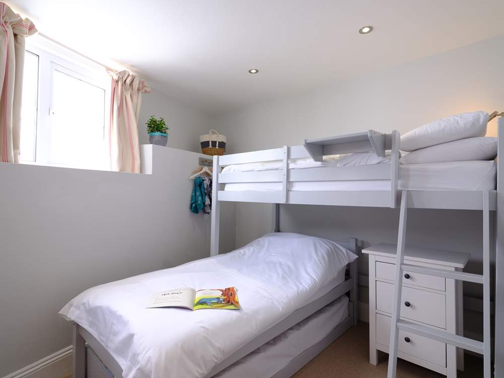 The twin room has bunk-beds and a truckle bed underneath if you don't wish to use the high bed, however this room is only suitable for two guests.