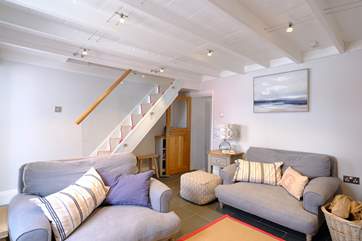The cosy sitting-room has two comfy Loaf sofas.