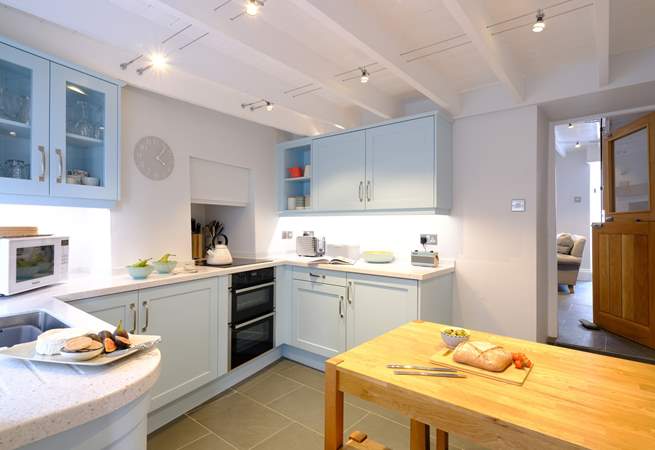 The kitchen is light, bright and equipped with everything you'll need for cooking up a holiday feast.