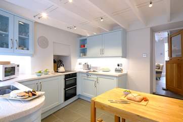 The kitchen is light, bright and equipped with everything you'll need for cooking up a holiday feast.