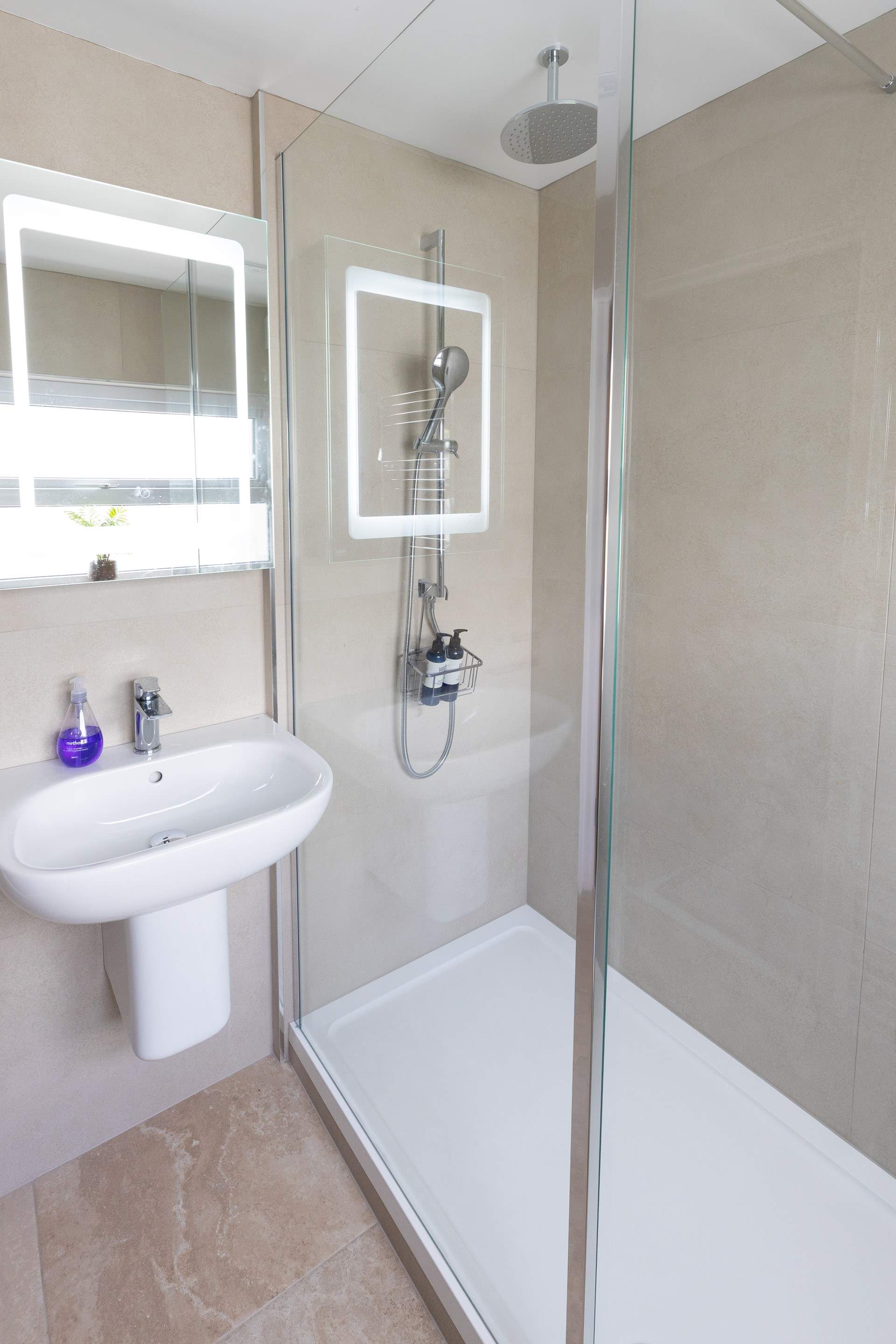 Enjoy an invigorating rainfall shower.