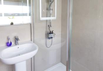 Enjoy an invigorating rainfall shower.