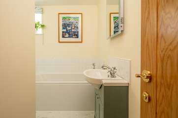 Peeking through to the bathroom.