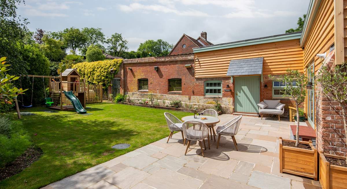 Sit back and relax on the patio where you can keep a close eye on little ones too. Please note that as of November 2021, the play equipment is being moved just the other side of the fence, in to the owners’ garden but will still be easily accessible. 