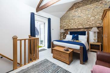 Bedroom two offers the perfect space for two to really relax and unwind. Especially as you can fling open the patio doors and step out onto your suntrap of a balcony.