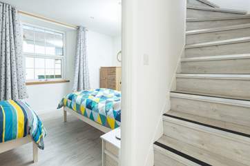 The stairs leading up to the second floor and bedroom two.